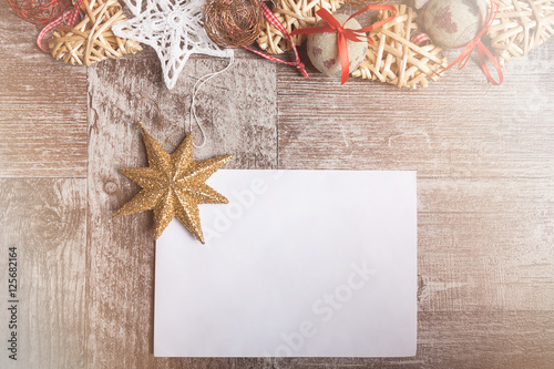 Christmas letter with ornaments arround it