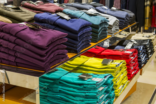 Colorful trousers, folded placed on Showcase.