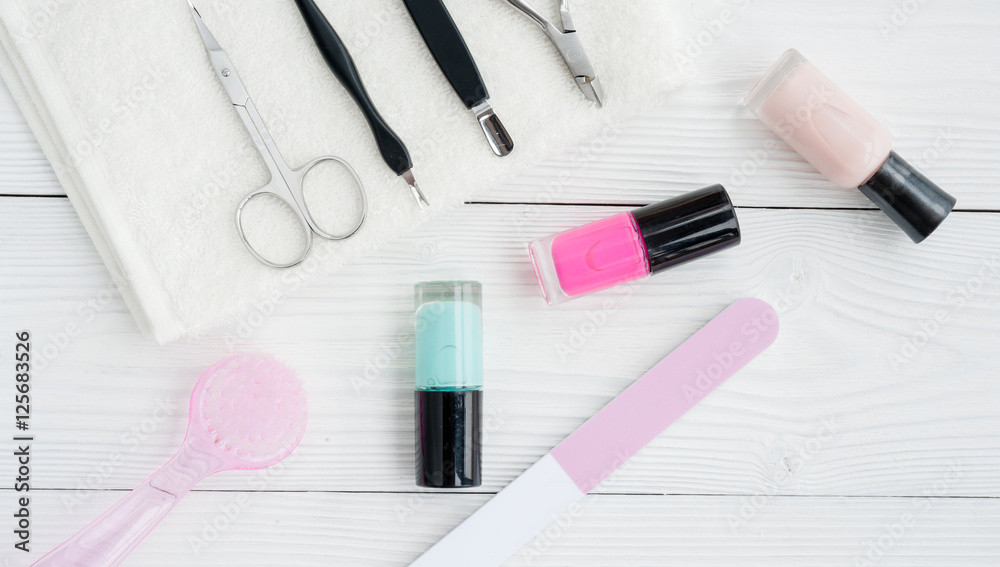 preparation for pedicure with nail polish wooden background top view preparation for pedicure with nail polish wooden background top view