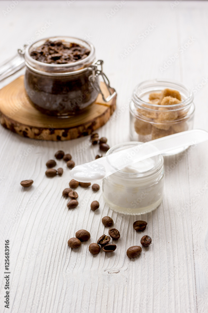 Organic cosmetics based on coffee wooden background Organic cosmetics based on coffee wooden background
