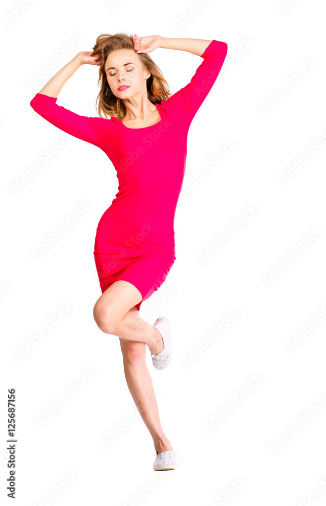 Young sexy playful slim pretty woman dressing red dress posing isolated on white Young sexy playful slim pretty woman dressing red dress posing isolated on white