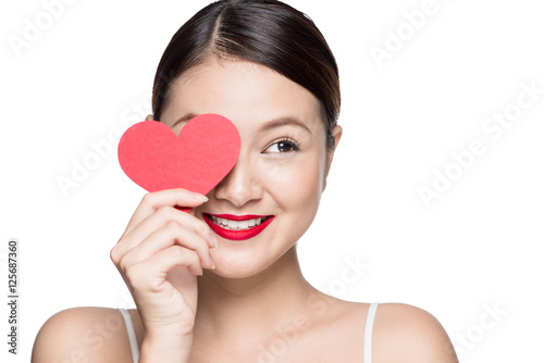 Cute attractive young woman with red heart. Valentine's day art