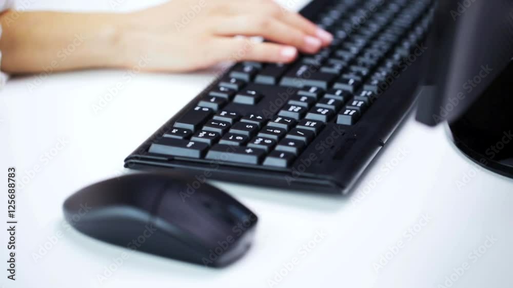 woman hands typing on computer keyboard at office woman hands typing on computer keyboard at office