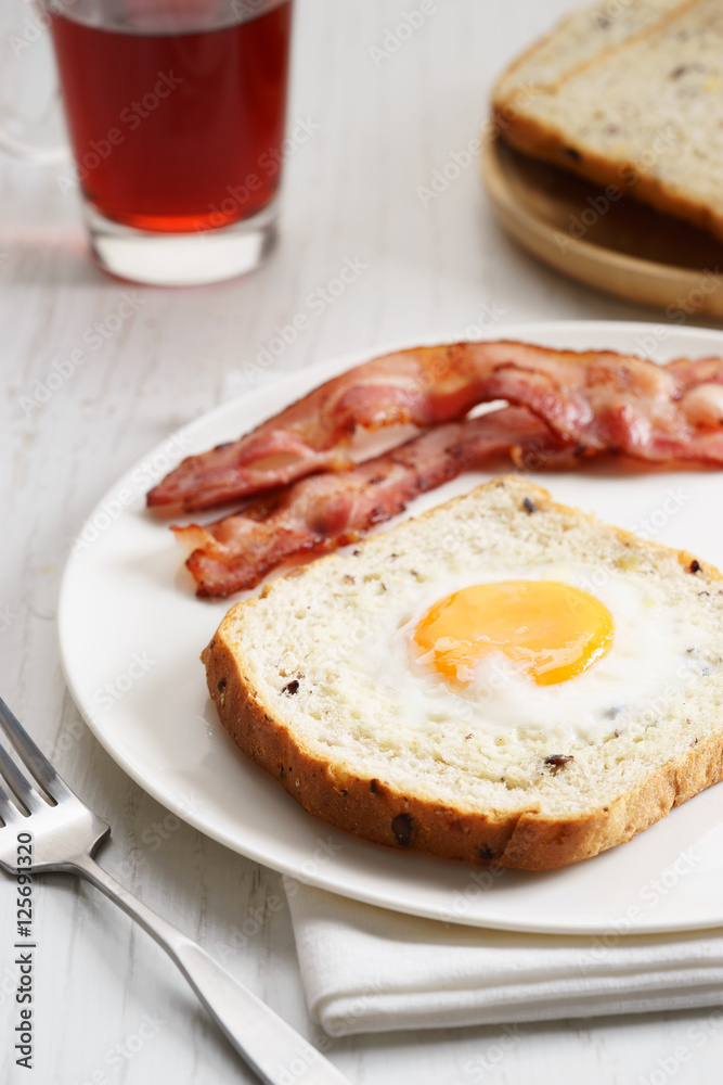 egg in a hole and crispy bacon egg in a hole and crispy bacon