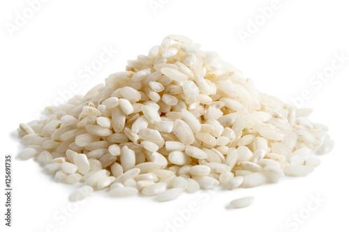 Pile of Arborio short grain white rice isolated on white. photo