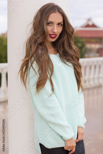 Pretty woman is wearing mint knitted sweater Free Download Pretty woman is wearing mint knitted sweater - GFXLoad
