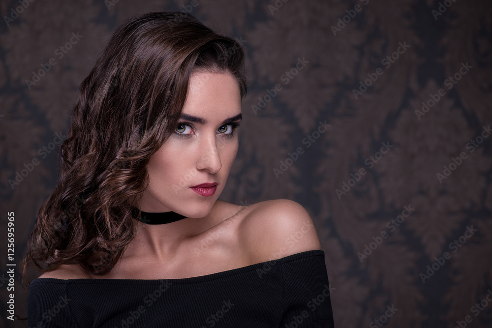Fototapeta premium Beauty. Portrait of a young woman with choker