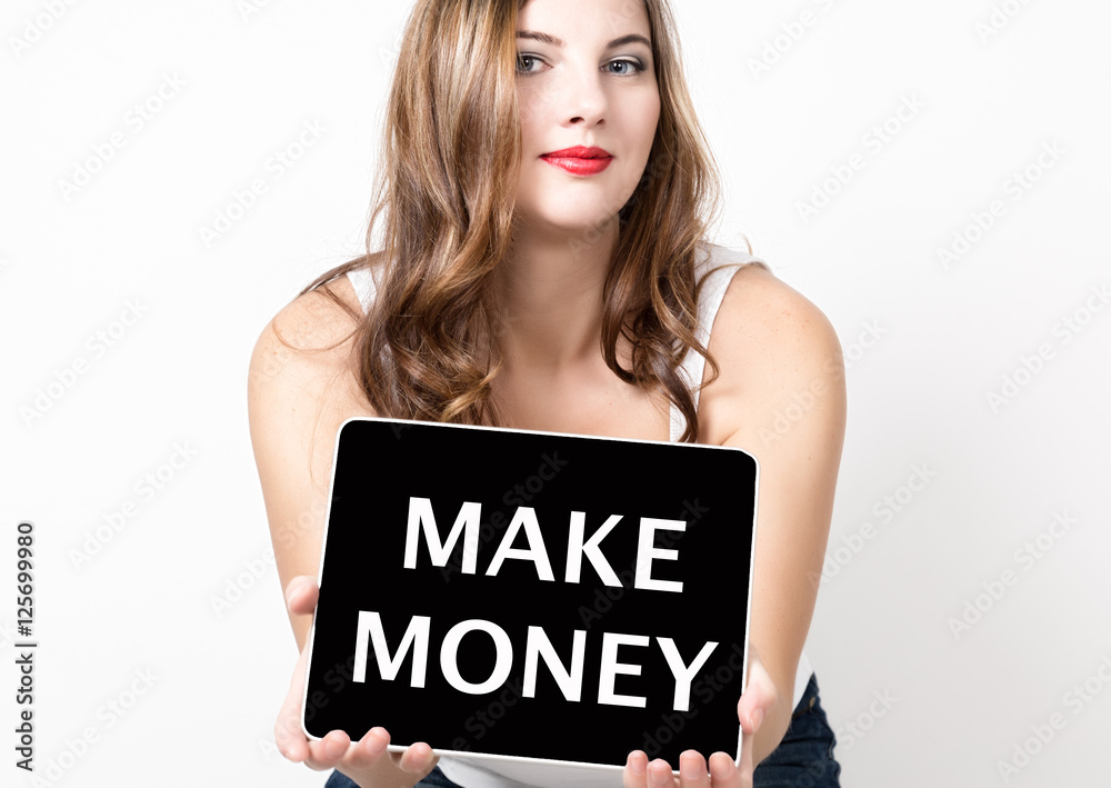 make money written on virtual screen. technology, internet and networking concept. beautiful woman with bare shoulders holding pc tablet make money written on virtual screen. technology, internet and networking concept. beautiful woman with bare shoulders holding pc tablet