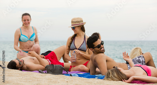 People sunbathing on the beach © JackF