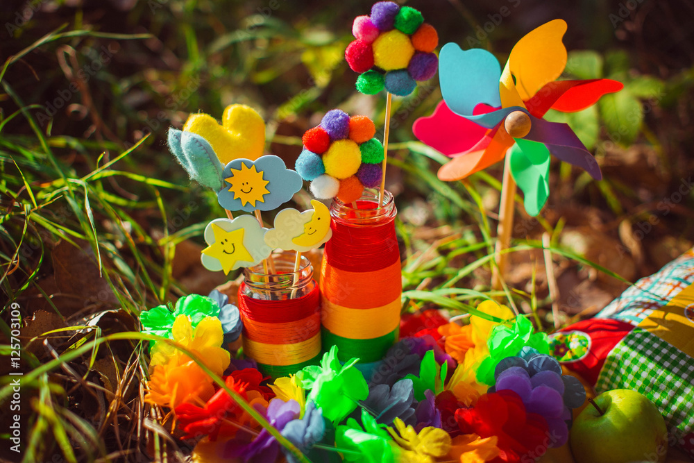 beautiful and funny colorful decorations lying in the grass