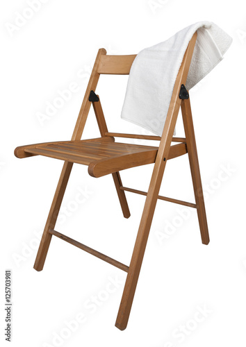 white towel on a wooden chair isolated on white background