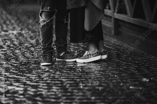 guy and girl under an umbrella