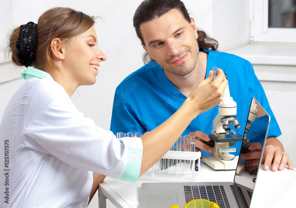Doctor shows test tube Doctor shows test tube