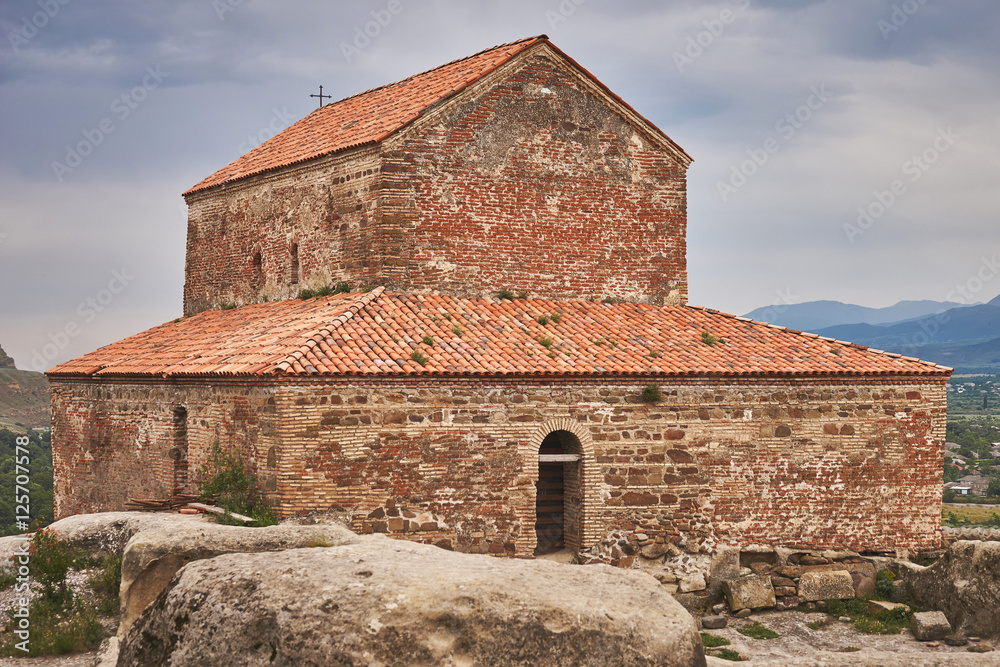 Ancient Orthodox Church in antique cave city Uplistsikhe, Georgia