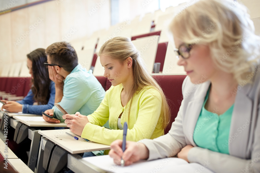 student girl with smartphone at lecture student girl with smartphone at lecture