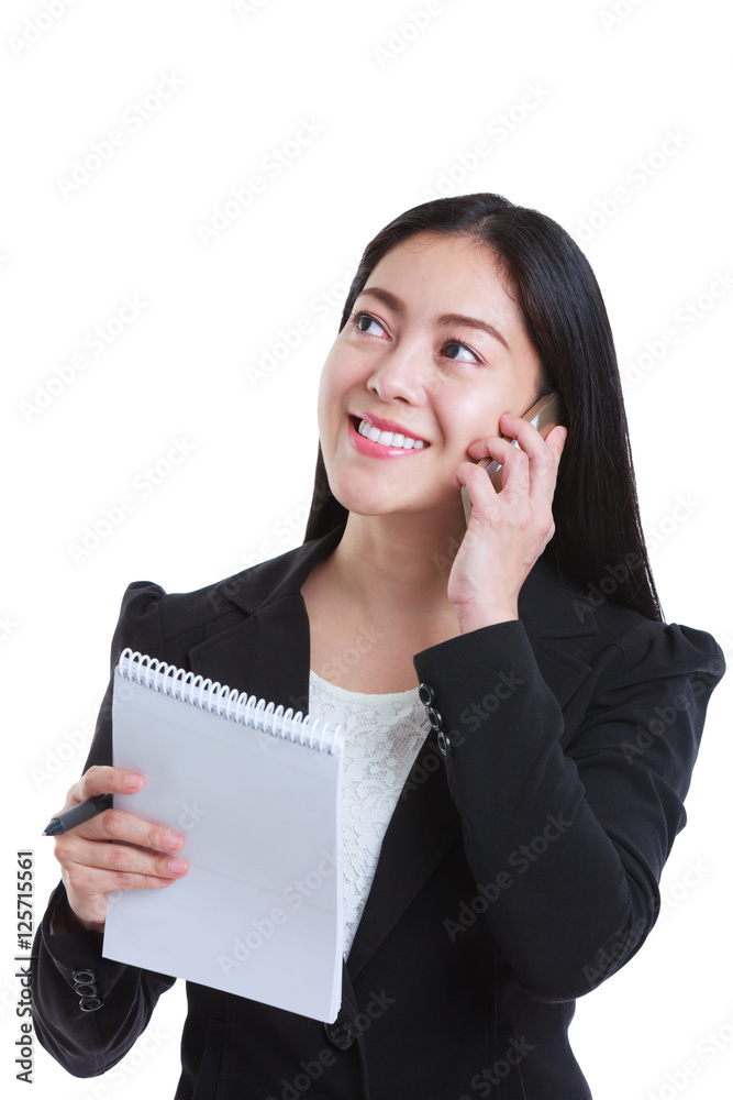 Successful businesswoman talking on the phone and holding note paper Successful businesswoman talking on the phone and holding note paper