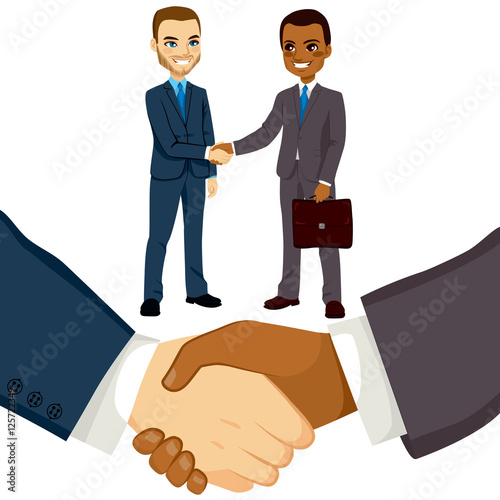 Young bussinessmen people shaking hands on a successful agreement