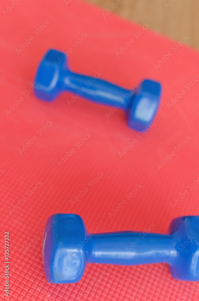 Fototapeta premium Photo of colorful barbells
