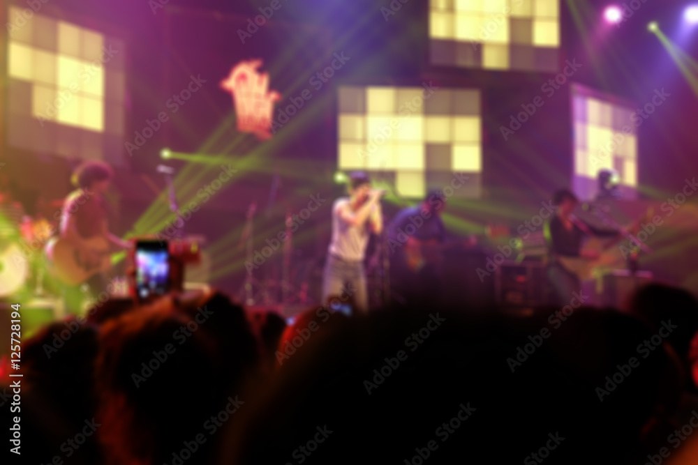 Blurred background : Bokeh lighting in indoor concert.