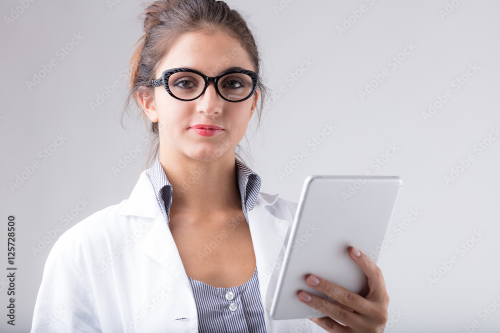 Dedicated doctor or nurse holding a tablet