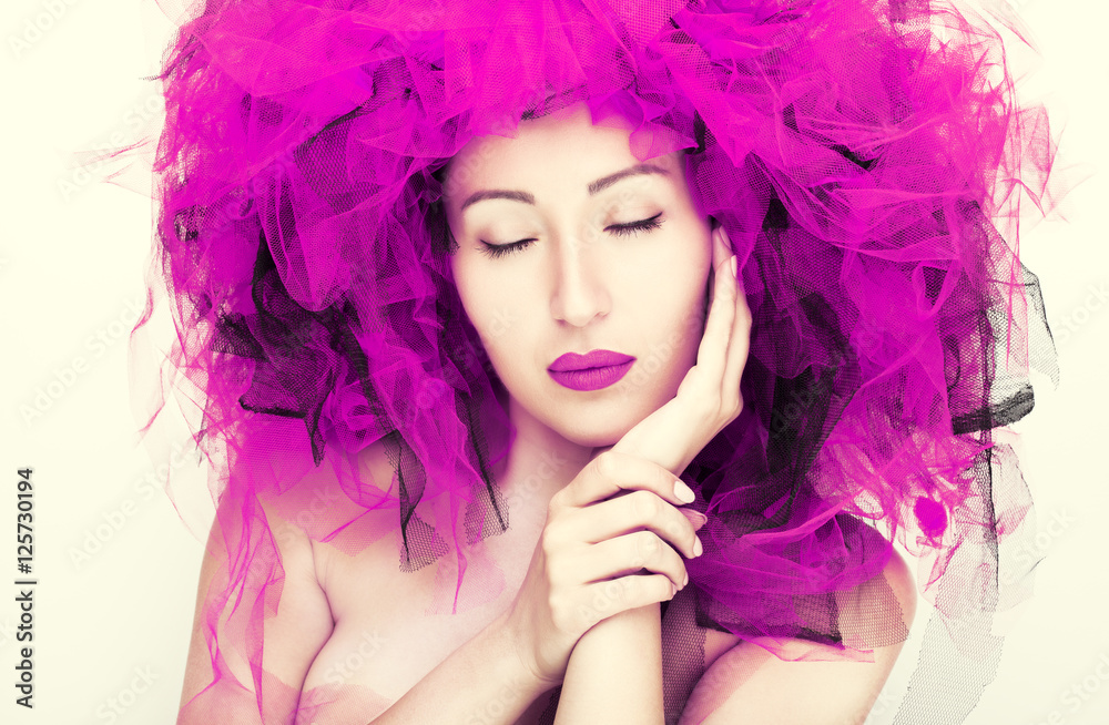 Portrait of beautiful woman with pink lips. Fashion photo