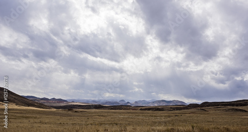 Stormy Landscape in Colorado with Mountains and Valley © RachelKolokoffHopper