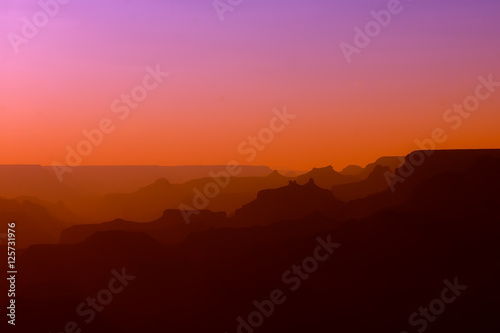 Panoramic View of Grand Canyon in red and purple colors after sunset © Michael Urmann