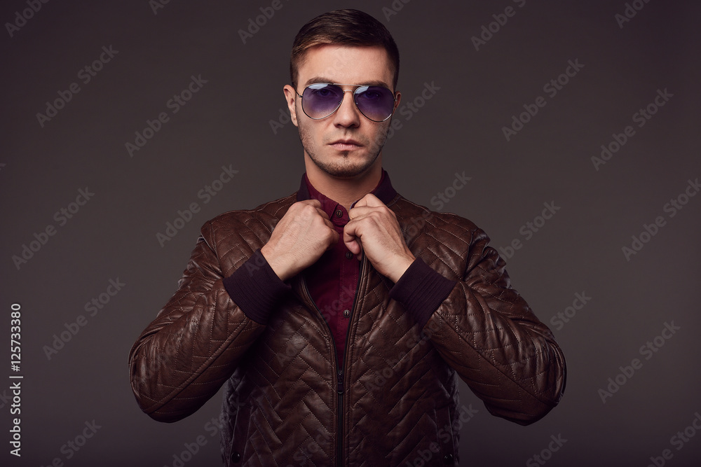 Fototapeta premium Fashion portrait of young handsome man