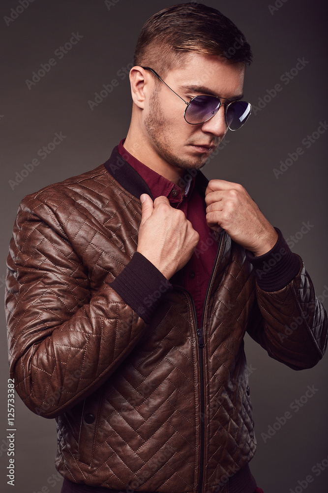 Obraz premium Fashion portrait of young handsome man