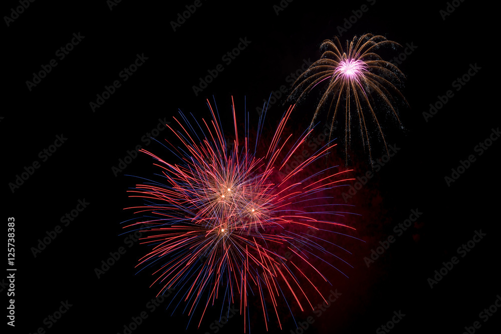 Colorful fireworks display forming a background