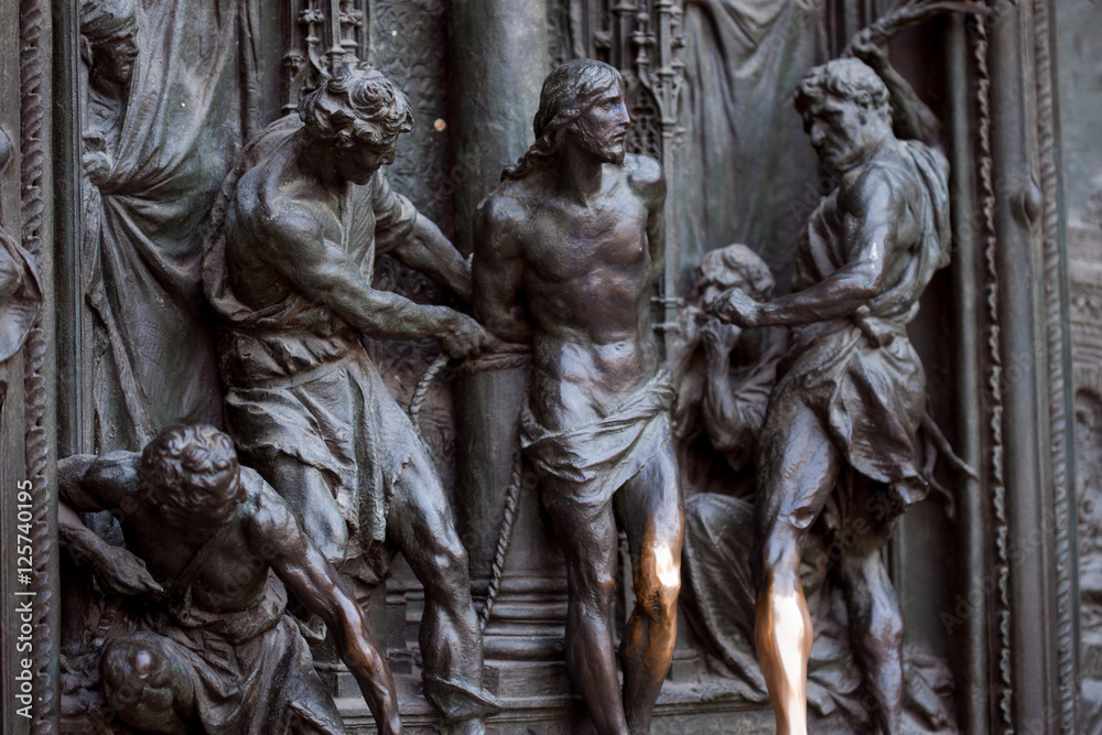 Detail of the Pieta scene in bas-relief at Milan's Cathedral doors, Detail of the Pieta scene in bas-relief at Milan's Cathedral doors,