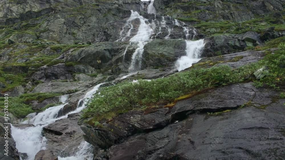 Scenic waterfall on road 55 between Gaupne and Lom. Norway Scenic waterfall on road 55 between Gaupne and Lom. Norway