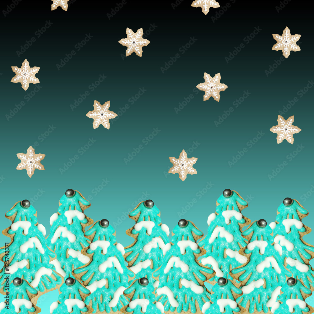 Beautiful festive background with Christmas cookies in the shape of Christmas trees 