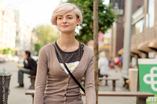 Young girl walking in the city