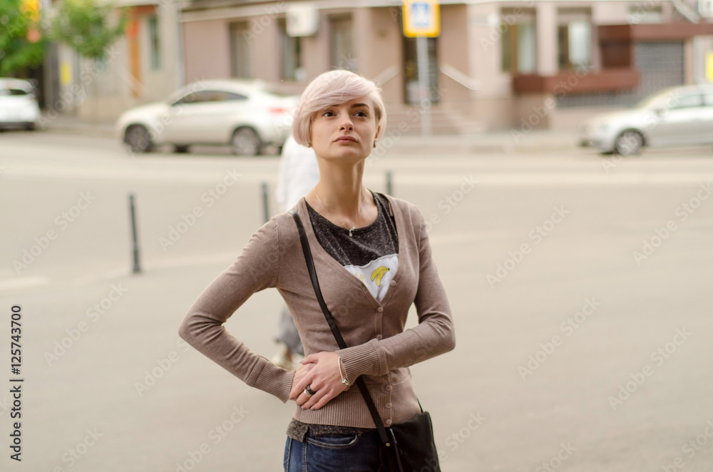 Young girl walking in the city