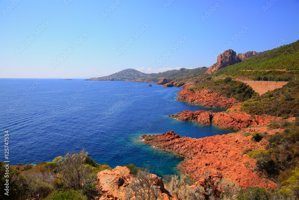 Esterel mediterranean red rocks coast, beach and sea. French Riviera in Cote d Azur near Cannes Saint Raphael, Provence, France, Europe