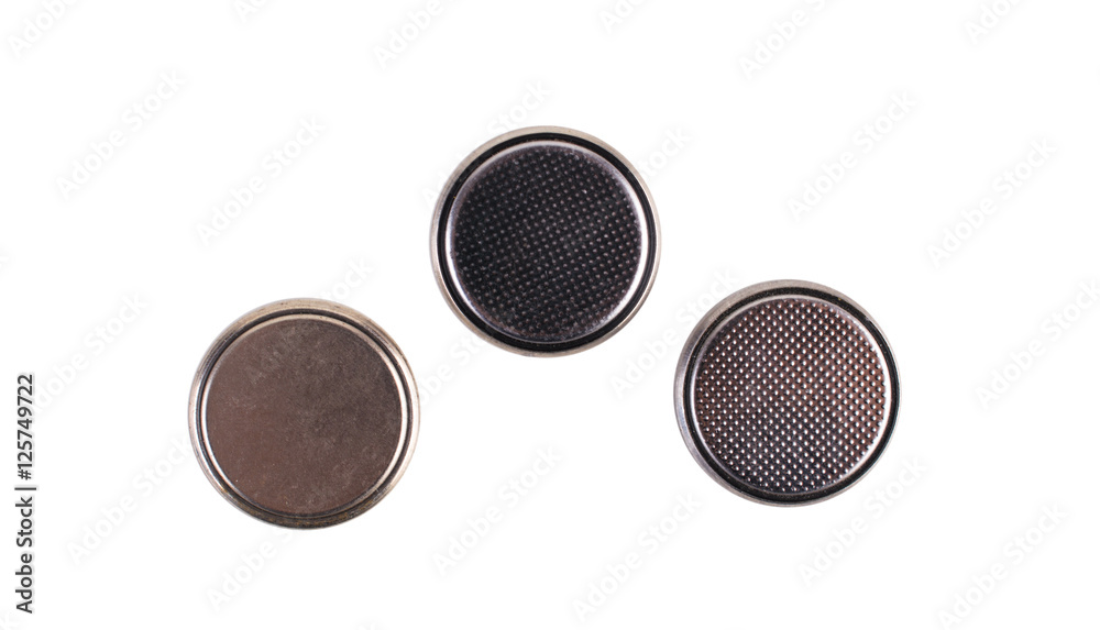 Lithium batteries arranged on white background Lithium batteries arranged on white background
