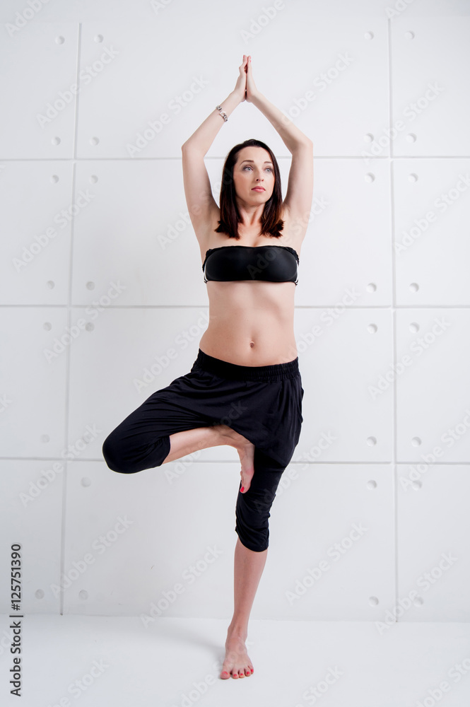 Woman practising yoga Woman practising yoga