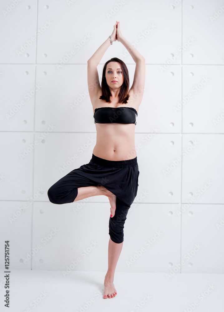 Woman practising yoga Woman practising yoga