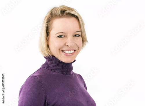 Konstfotografi Shot of a blonde woman lying and smiling in front of a white background
