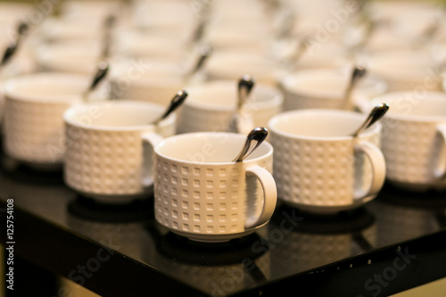 tea sets, collection white coffee cups, buffet, catering photo