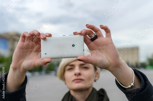 Young girl makes selfie
