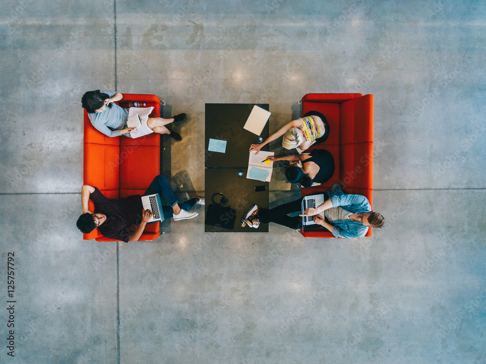 © Jacob Lund - University students with books and laptop