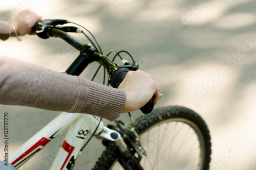 Young girl with a bicycle
