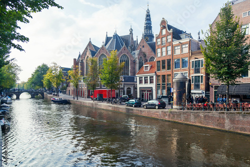 Traditional houses of Amsterdam with canals and bridges