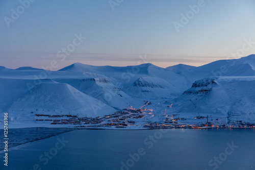 Worlds northernmost town - Longyearbyen in blue light photo