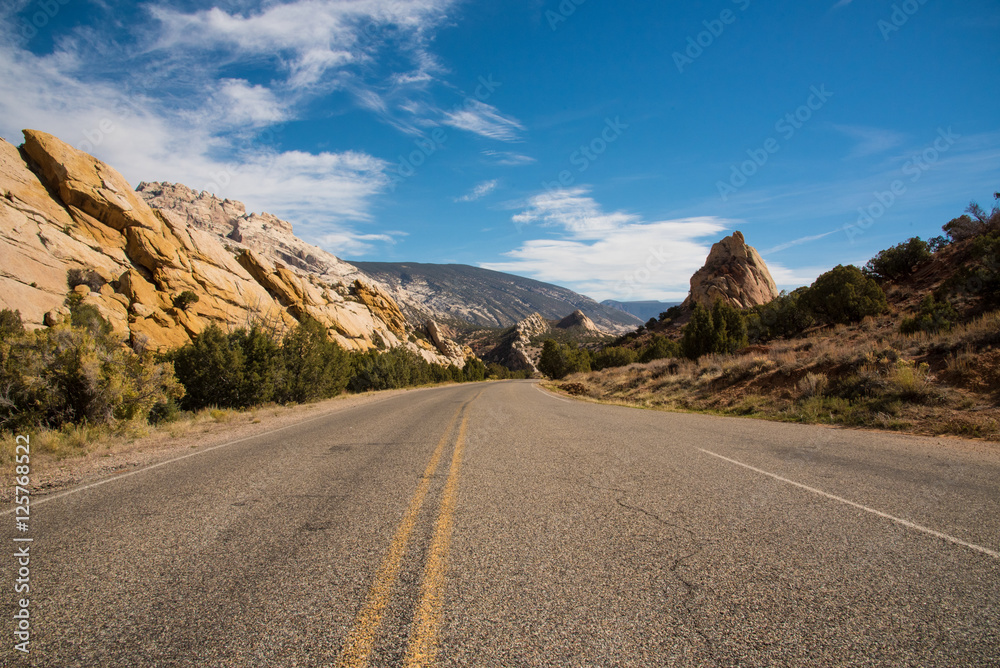 Highway through Northern Utah sandstone landscape