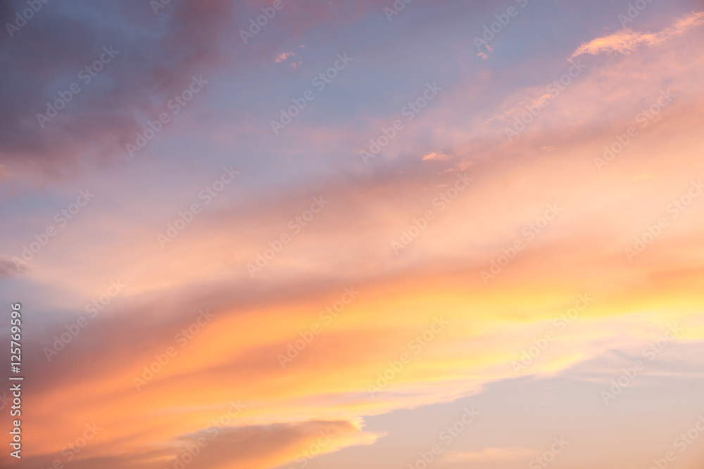 Orange Clouds against the blue sunset sky