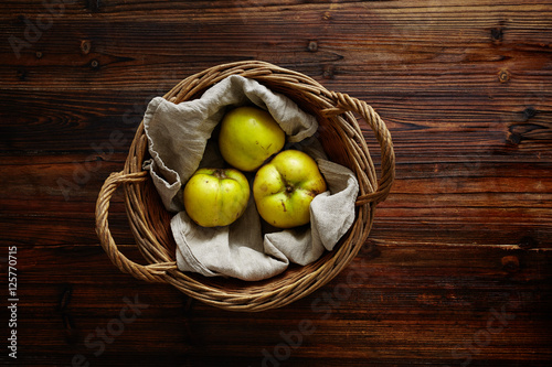 basket filled with quinces photo