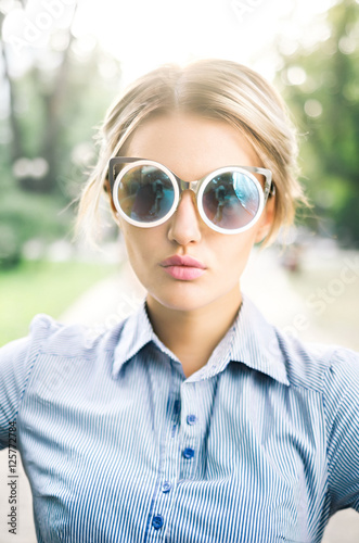 Outdoors portrait of beautiful young girl..